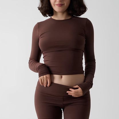 T-shirt à manches longues pour femmes de Little Melon, confection confortable et décontractée, en tissu doux et élégant.